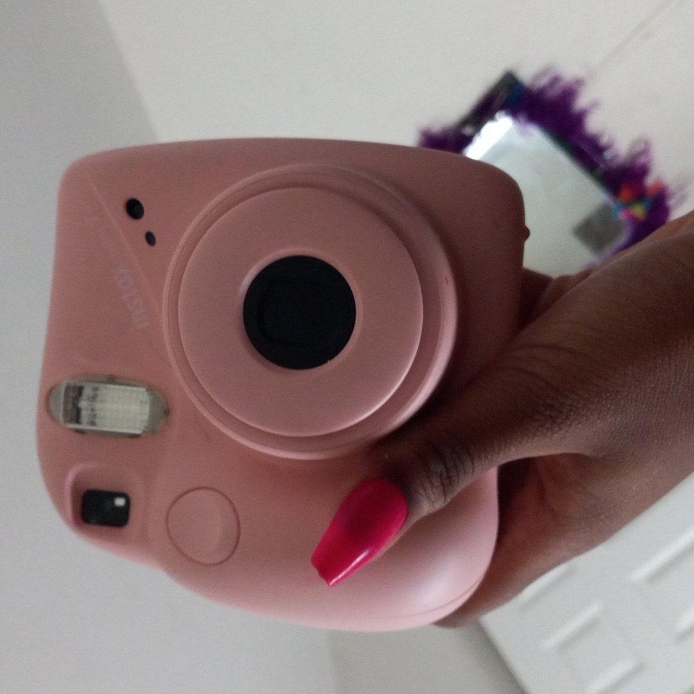 Pink Polaroid camera instax mini 7